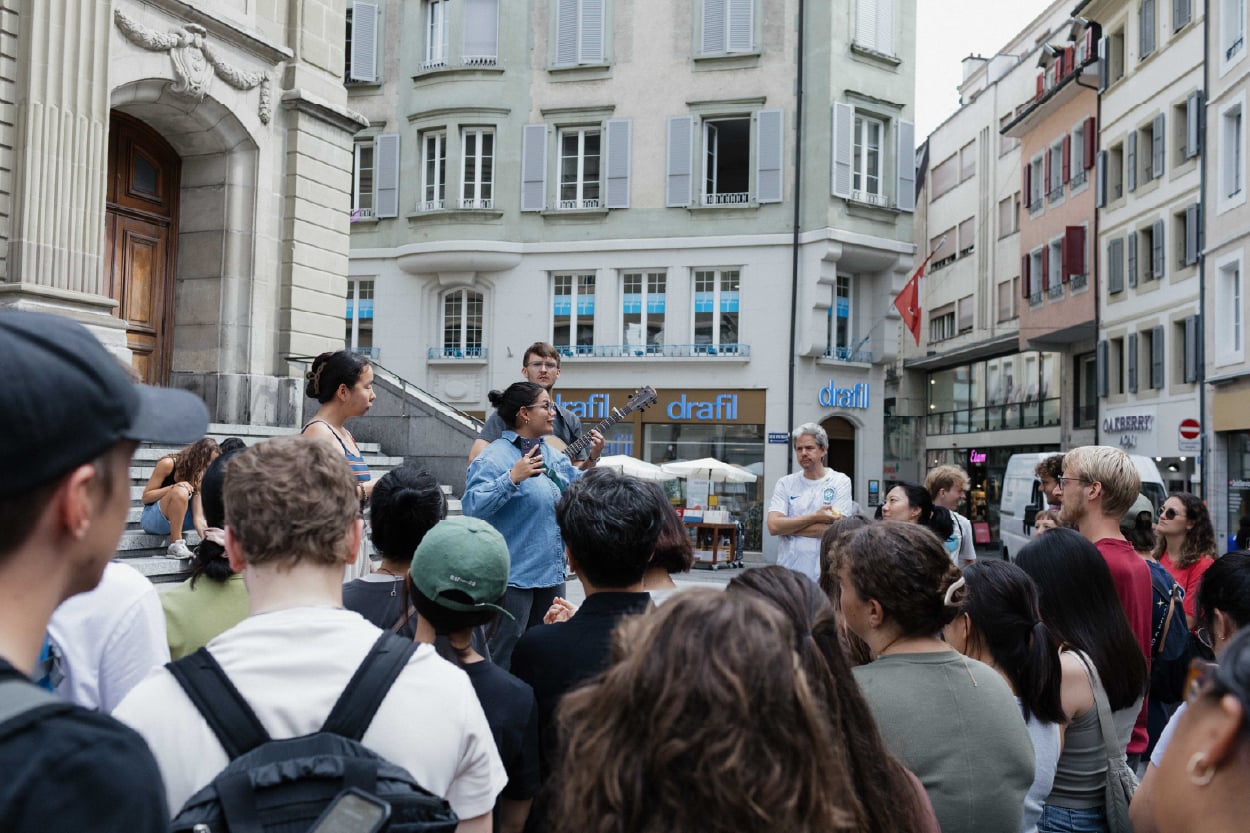 YWAM Lausanne team sharing in a public square in Lausanne